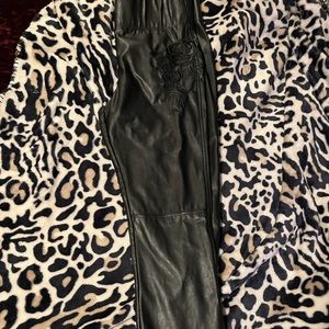 Like NEW …Ankle length nylon pants ..flower embroidery on pant leg in front